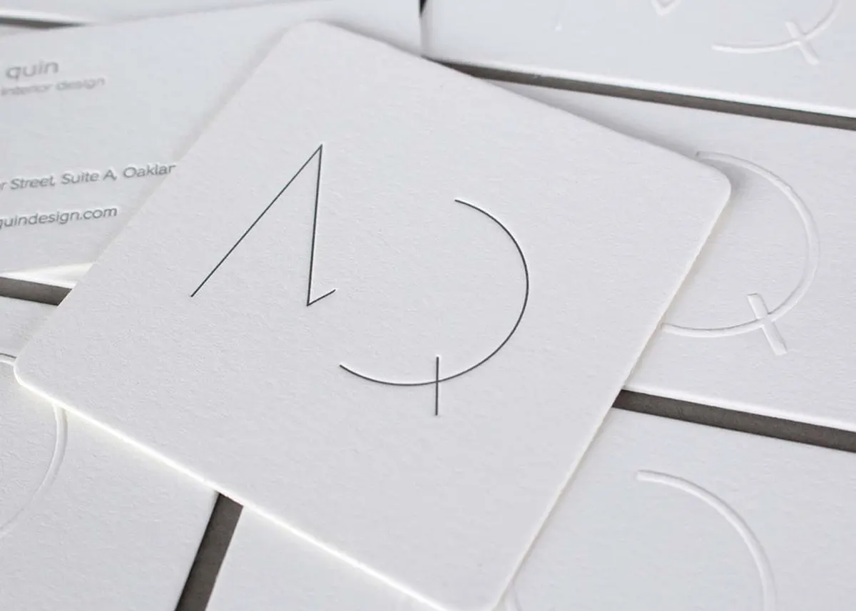 Close-up of blind emboss raised impression created with die and counter die on cotton paper