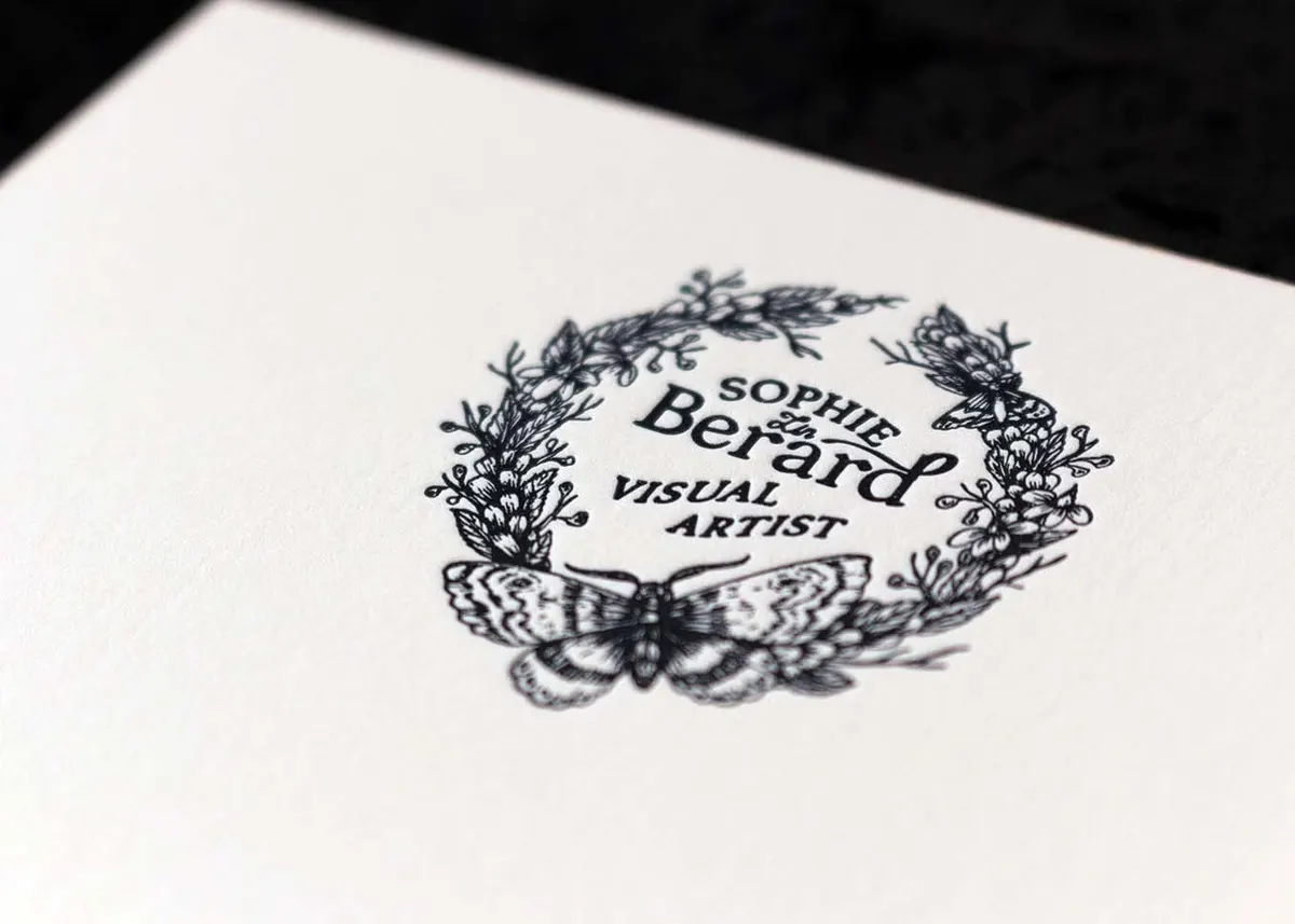 Open envelope showing letterpress printed liner on Kraft Speckletone paper with mystical design
