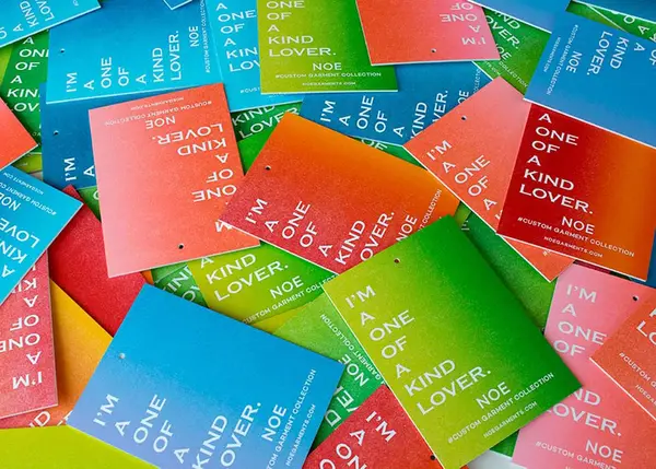 Colorful rainbow roll letterpress hang tags showing multiple split fountain color variations